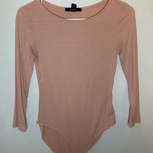 Baby pink bodysuit.